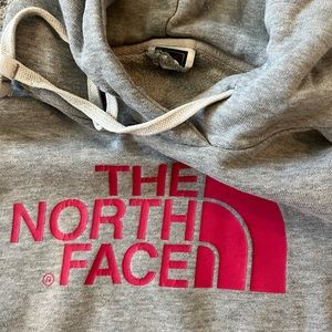 Girls grey hodded NorthFace sweatshirt.